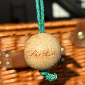 Loro Piana Wooden Sphere with Green Cord